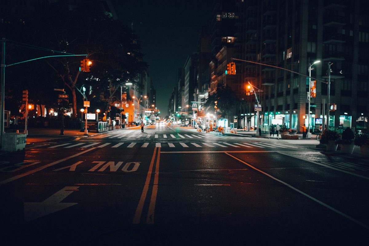 Traffic light trails on a city street at night